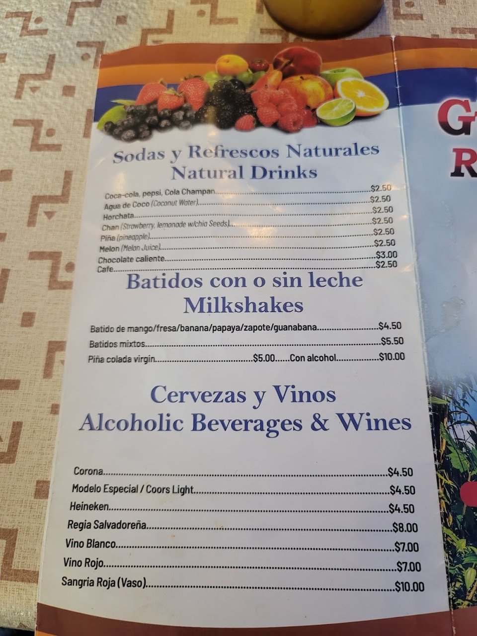 Restaurant menu featuring fish, pork, and ceviche.